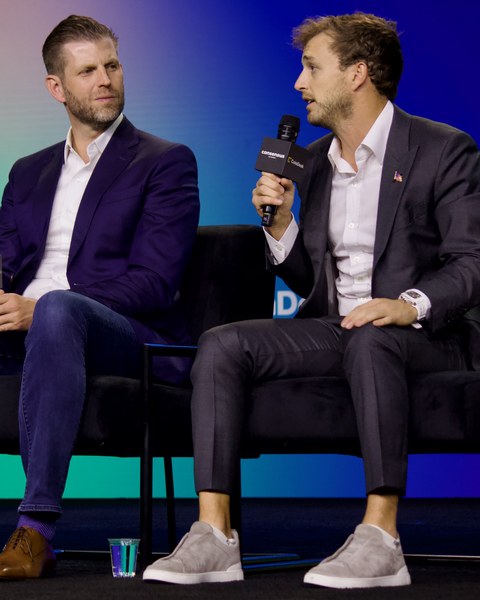 Eric Trump and Zach Witkoff on stage at the Consensus 2025 crypto conference in Toronto
